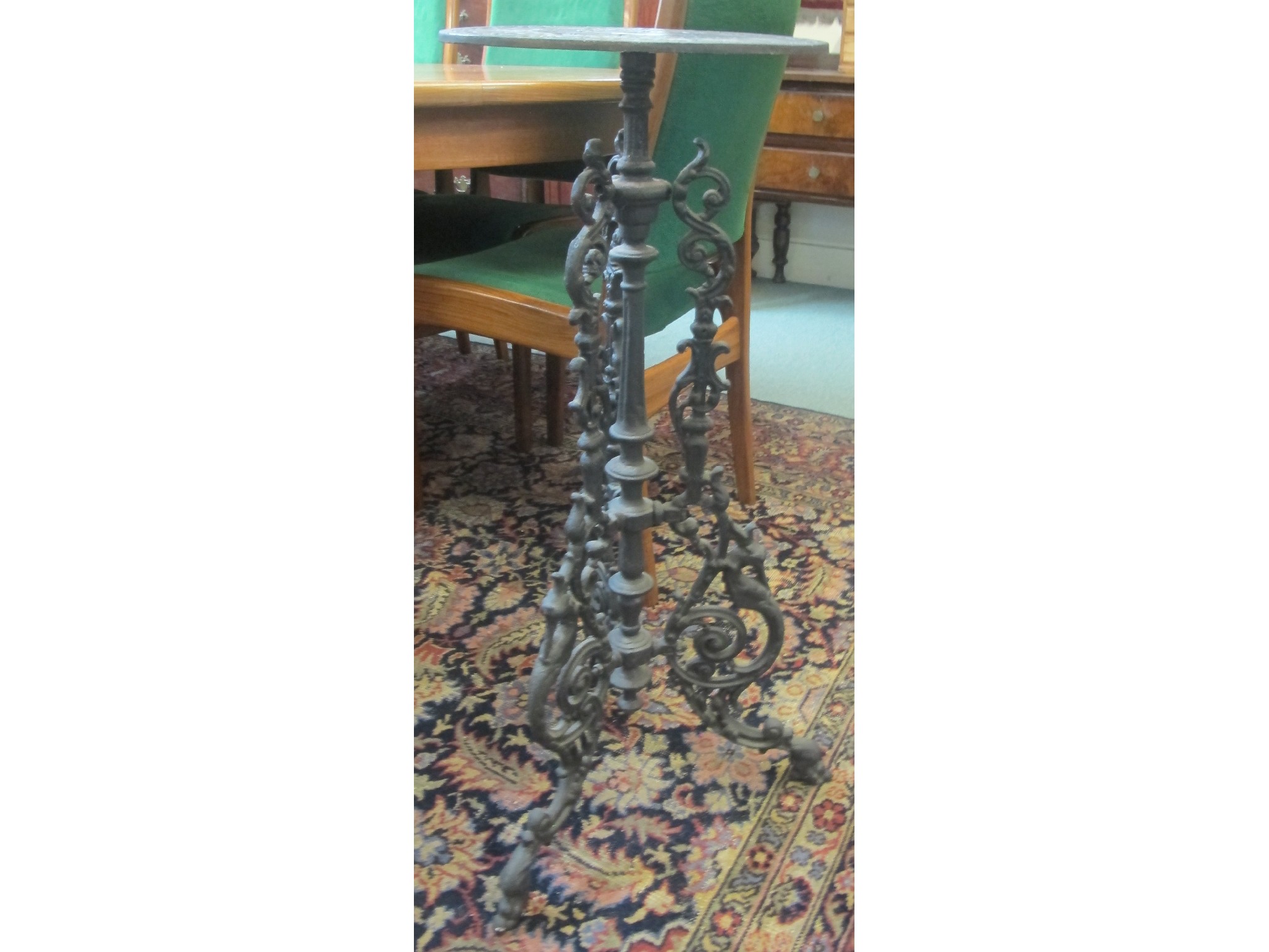 Appraisal: A cast iron plant stand with floral design