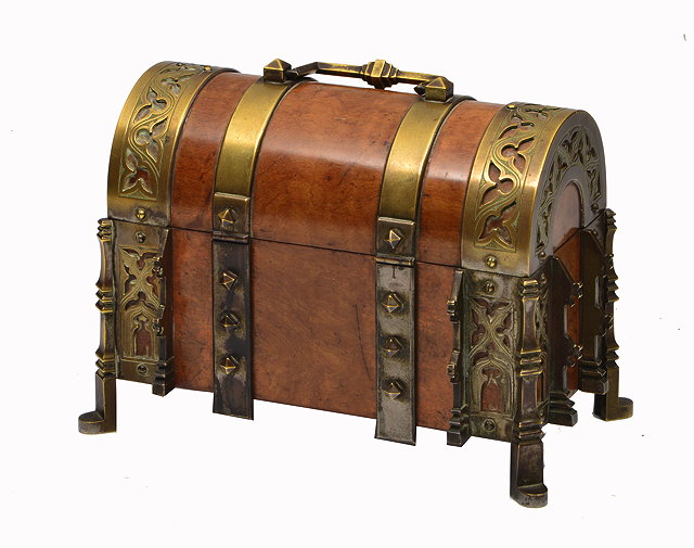 Appraisal: A GOTHIC REVIVAL WALNUT AND METAL MOUNTED DOMED TOPPED CASKET