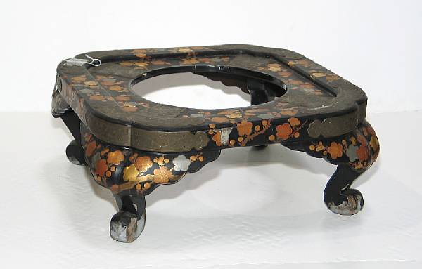 Appraisal: A black and polychrome lacquered wood hibachi stand Of cusped