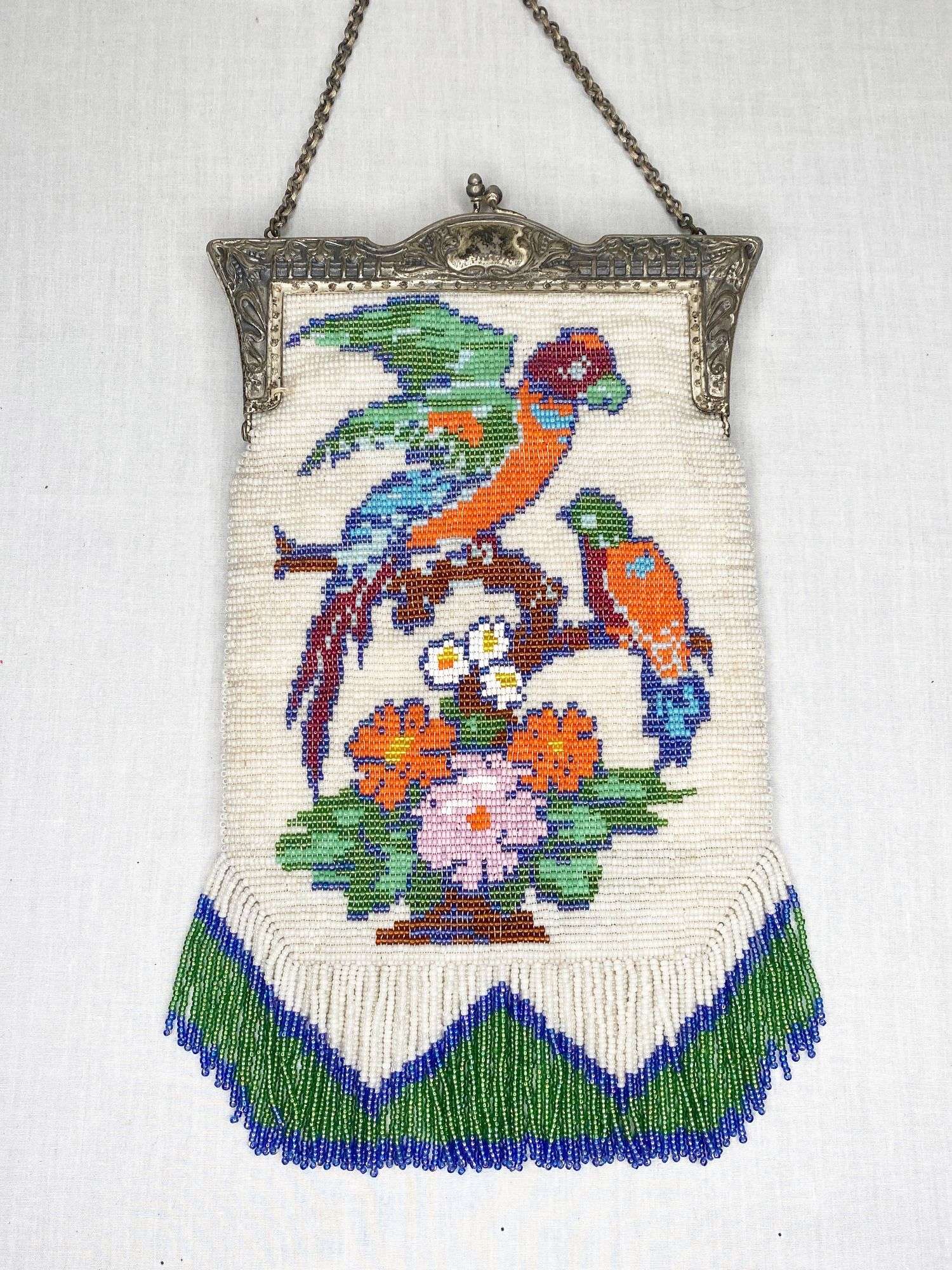 Appraisal: Micro Beaded Birds Purse with Silver Plated Frame long widest