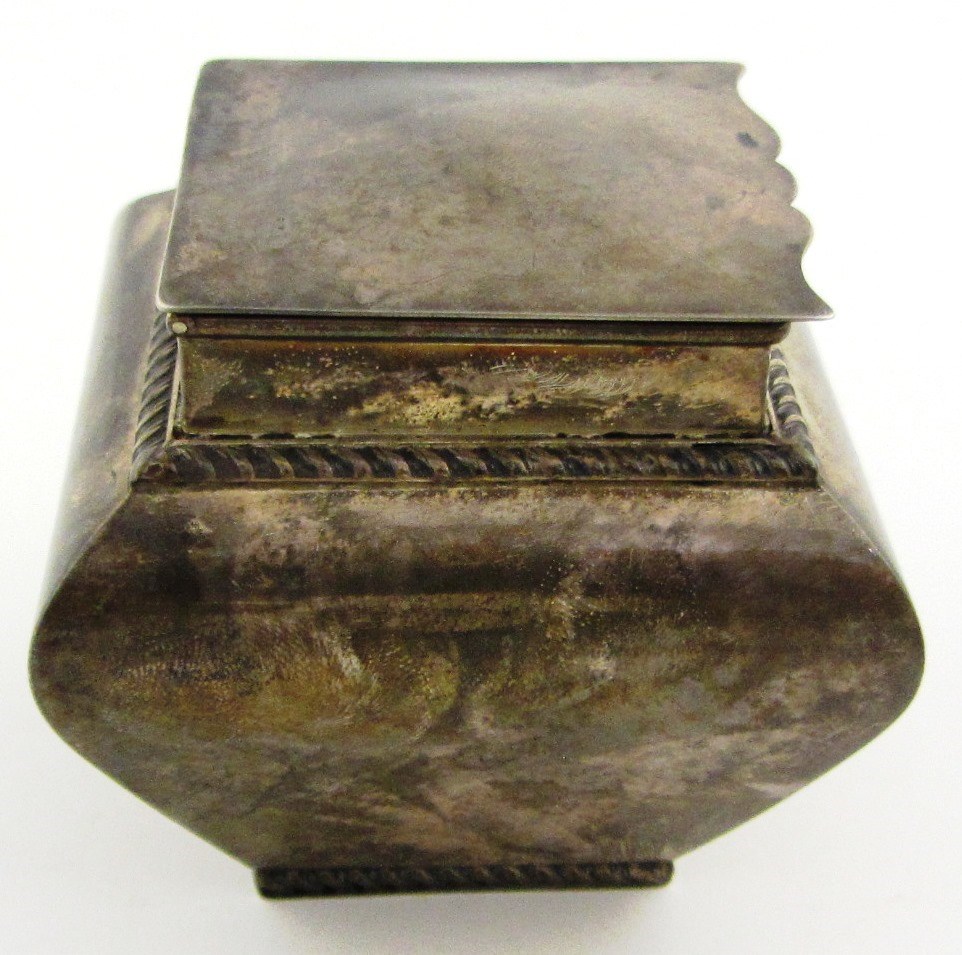 Appraisal: A silver hinge lidded tea caddy of square section form