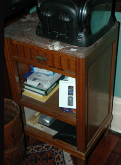 Appraisal: AN OAK MARBLE TOP SIDE CABINET