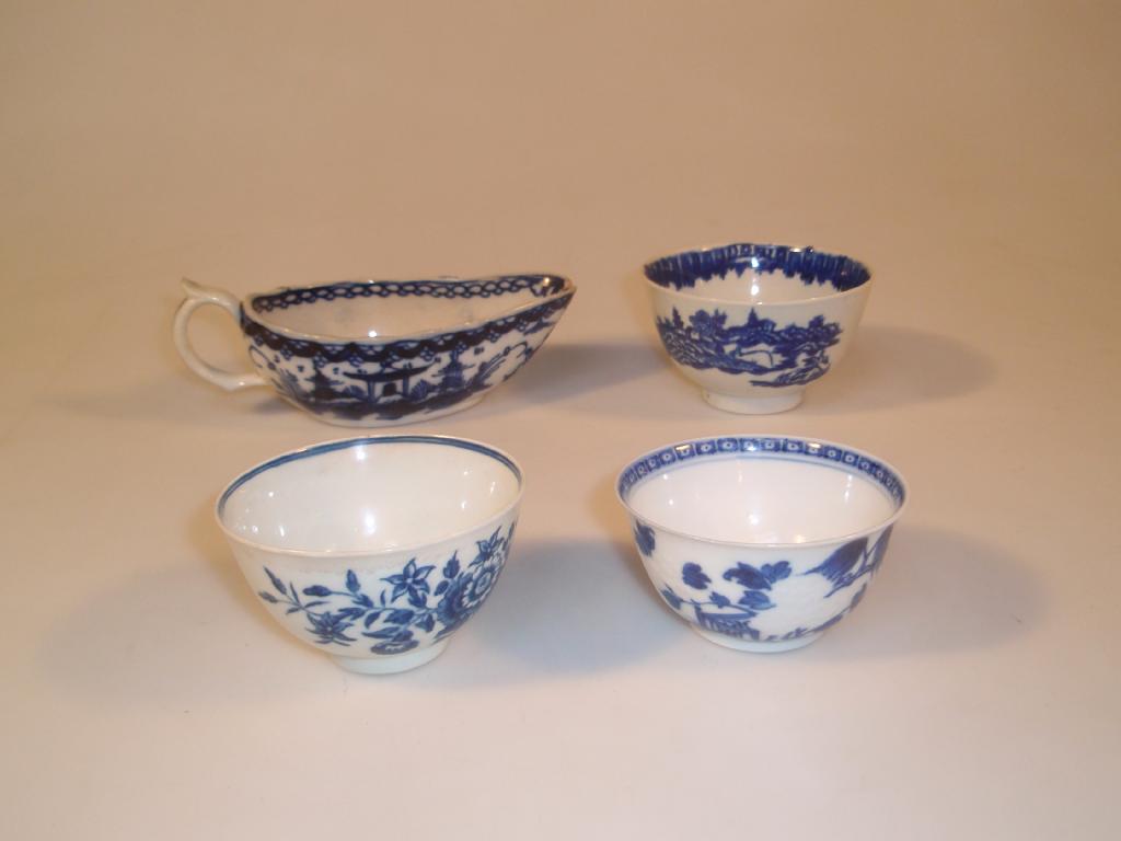 Appraisal: An thC English blue and white sauce boat possibly Liverpool