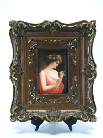 Appraisal: Antique porcelain plaque signed Wagner depicting ''Marguerite'' with embossed ceramics