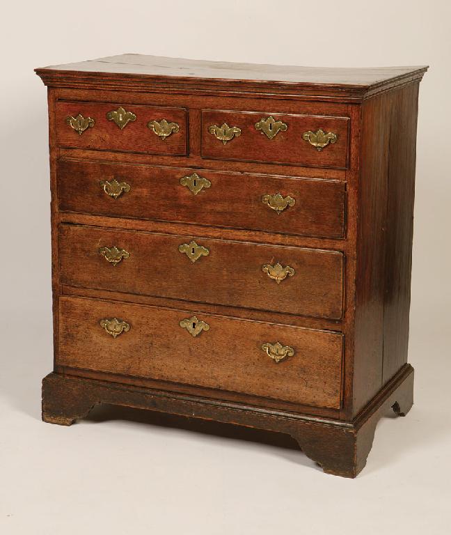 Appraisal: A GEORGE II OAK CHEST OF DRAWERS with a rectangular