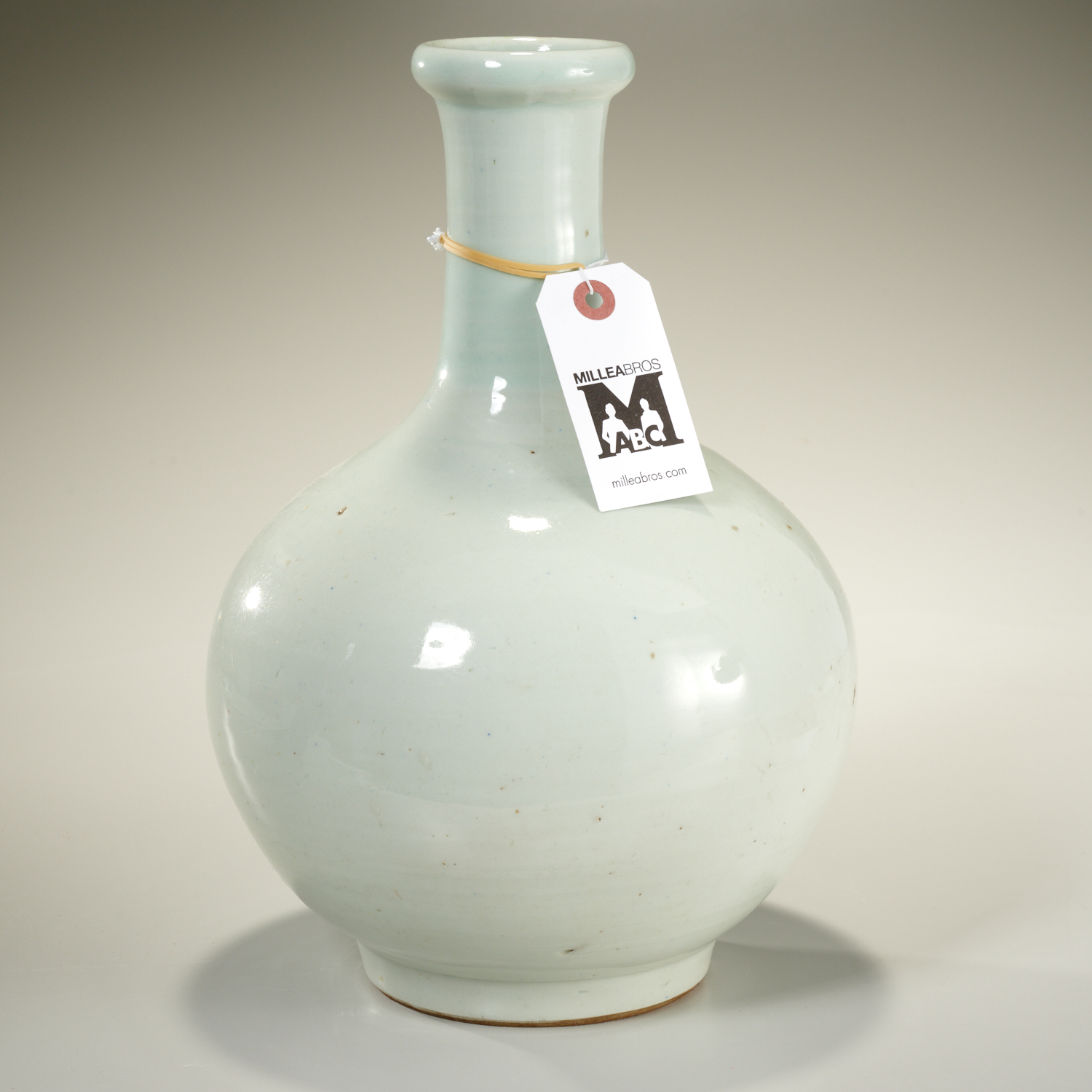 Appraisal: CHINESE PORCELAIN BOTTLE VASE th th c faint celadon white