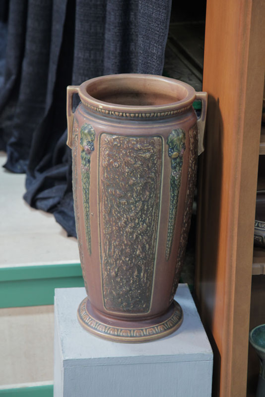 Appraisal: ROSEVILLE UMBRELLA STAND Double handled in Florentine pattern Stamped with