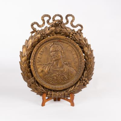 Appraisal: A gilded decorative plaque of Sir John Gielgud as Julius