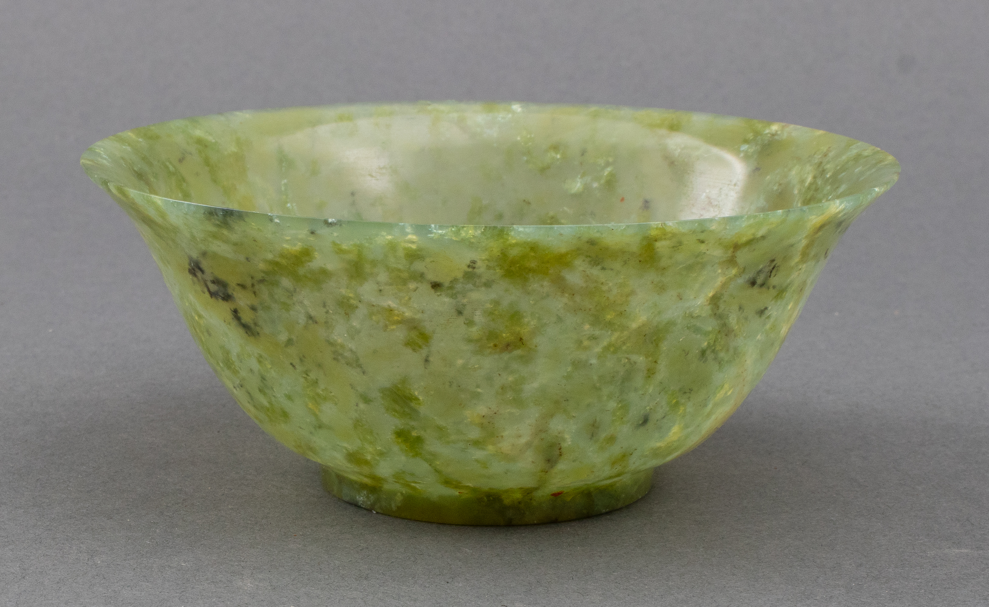 Appraisal: CHINESE GREEN JADE BOWL Chinese mottled green jade bowl with