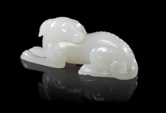 Appraisal: A Finely Carved White Jade Model of a Hound depicting