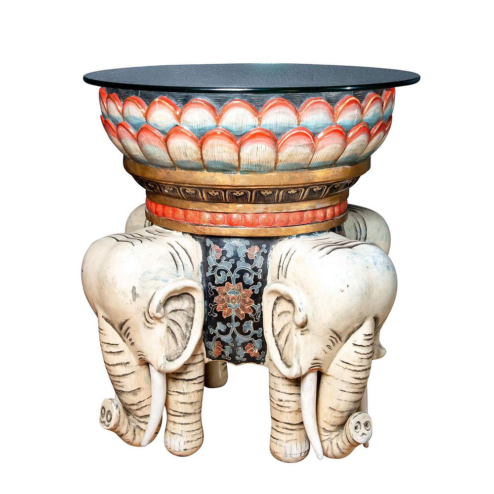 Appraisal: ALLEGORICAL CHINESE POLYCHROME WOODEN ELEPHANT TABLE Figural base tusked elephants