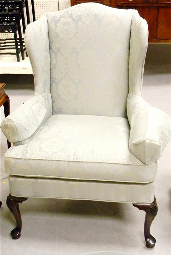 Appraisal: Wing chair green upholstery cabriole legs with shell carved knees