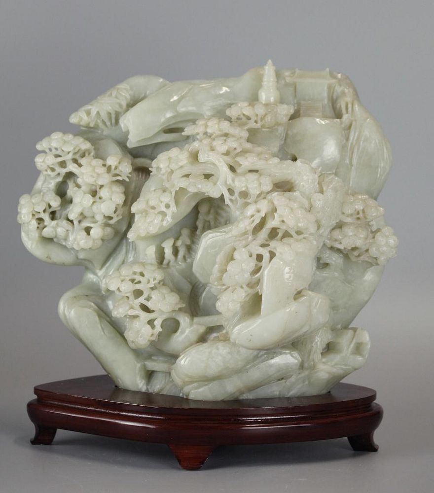 Appraisal: Chinese jade boulder carved w landscape scene carved on both