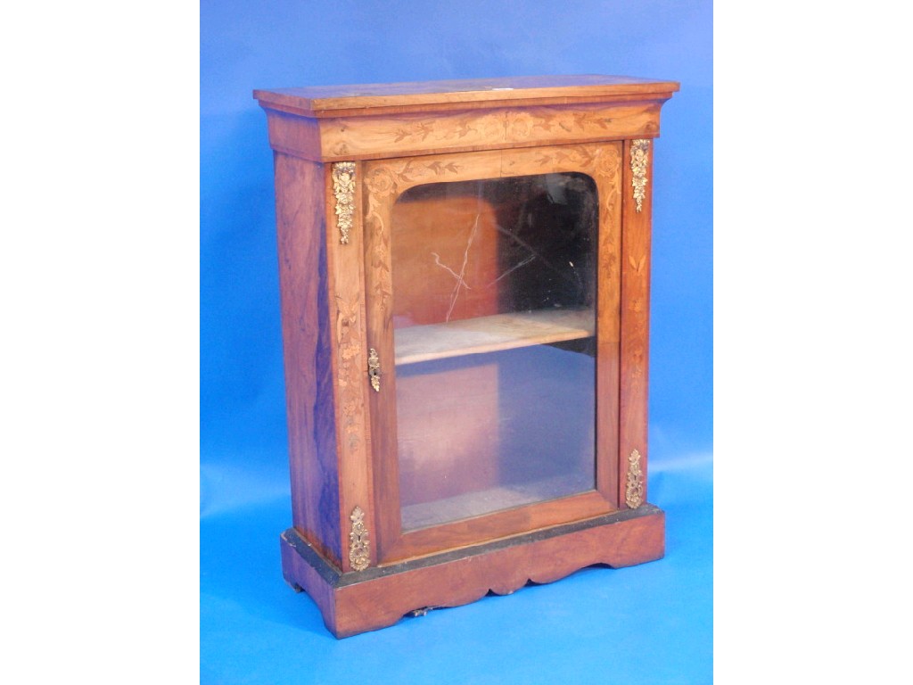 Appraisal: A Victorian walnut marquetry pier cabinet with single glazed door