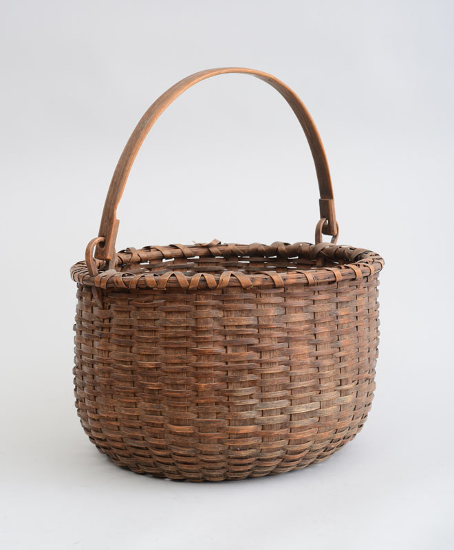 Appraisal: WOVEN WICKER BASKET With bentwood swing handle x in Estimate