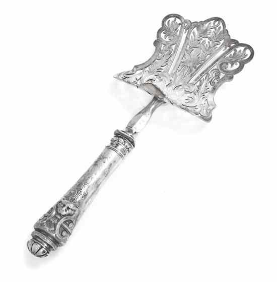 Appraisal: A French Silver Asparagus Server the handle with lion's mask