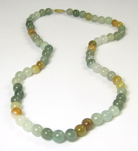 Appraisal: MULTI-COLOR JADE BEAD NECKLACE having round graduated jade beads in