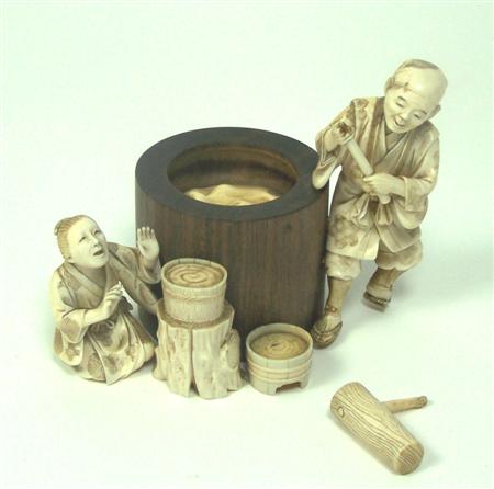 Appraisal: A Japanese ivory and wood okimono of laundry workers Meiji