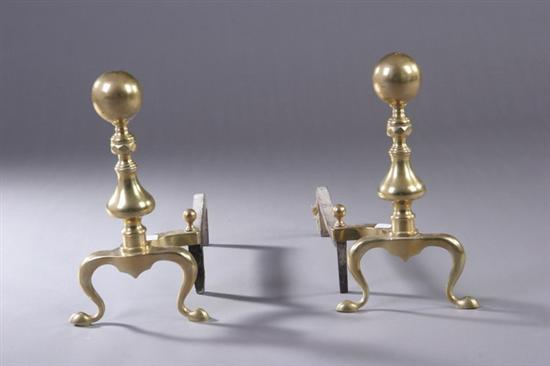 Appraisal: PAIR BRASS AND WROUGHT IRON ANDIRONS th century Inverted-baluster standard