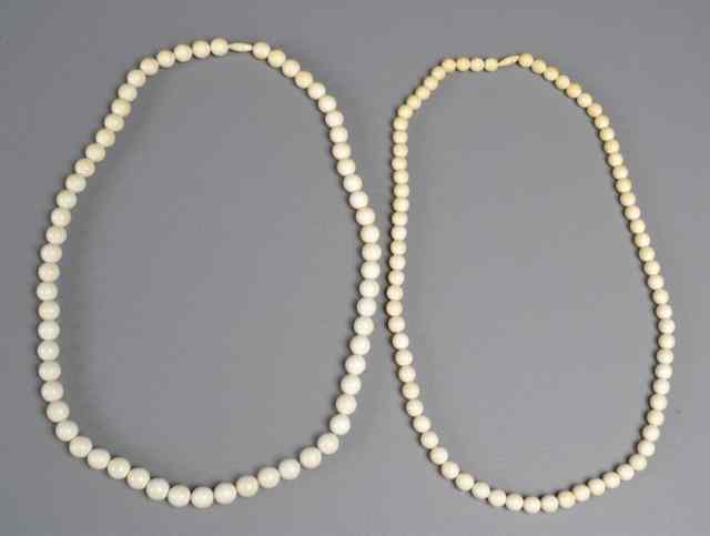 Appraisal: Large Chinese Ivory NecklacesBoth strung with circular beads each measuring