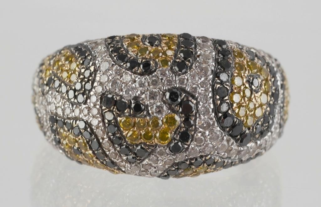 Appraisal: Leopard pattern ring with colored diamond in k yellow gold