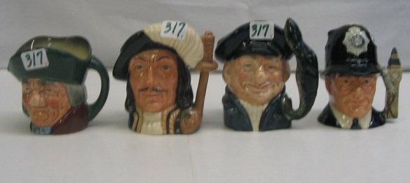 Appraisal: A GROUP OF FOUR GLAZED ROYAL DOULTON CHARACTER MUGS small