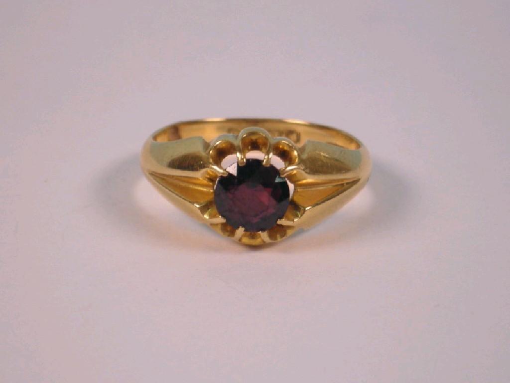 Appraisal: A garnet set gentleman's signet ring ct gold