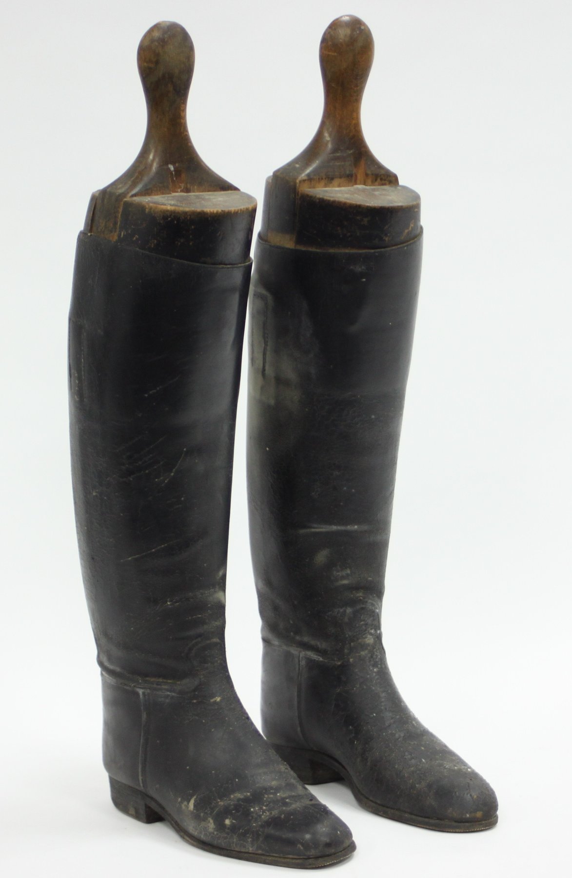 Appraisal: A pair of ladies black riding boots with the wooden