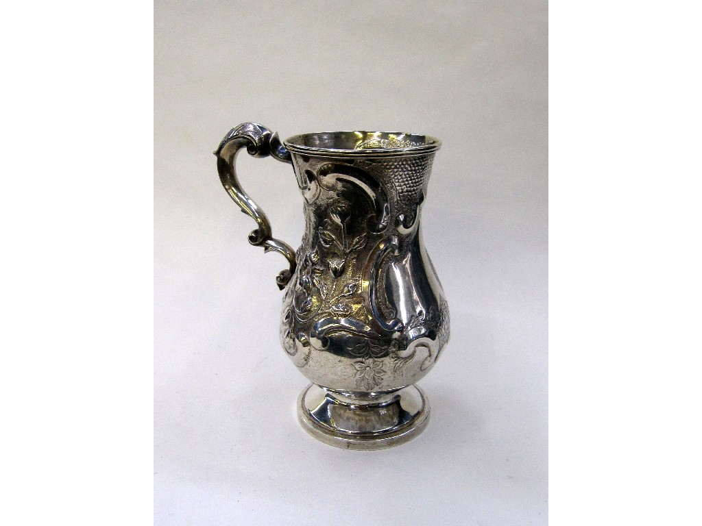 Appraisal: Georgian silver tankard with later embossed decoration possibly Edinburgh