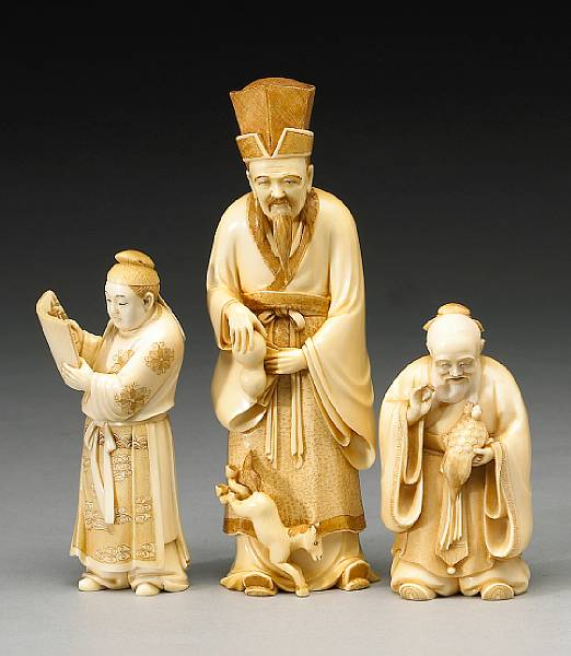 Appraisal: Three figural ivory okimono th Century The first depicting a