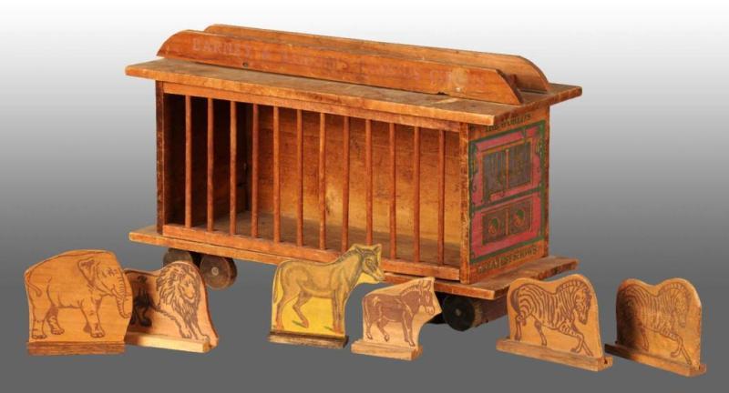 Appraisal: Wooden Barney Bailum's Circus Cage Wagon Toy Description Includes six