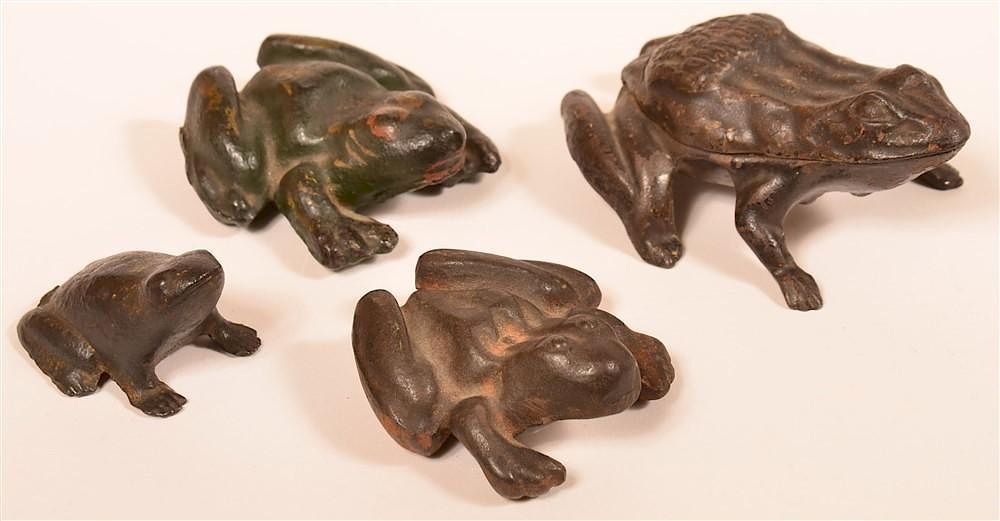 Appraisal: Four Various Cast Metal Frog Paperweights Four Various Cast Metal