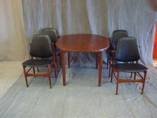 Appraisal: Danish Modern Table and Chairs Four leaves From a Riverdale