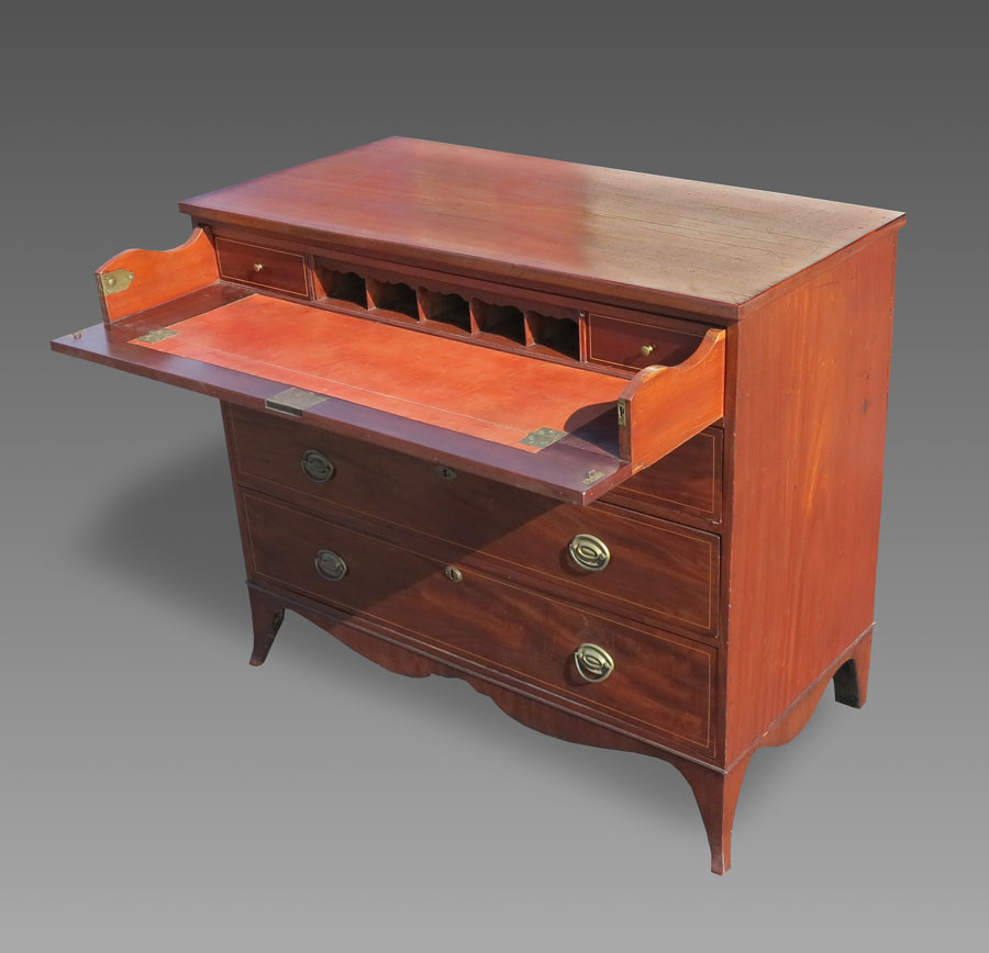 Appraisal: PERIOD BUTLER'S CHEST Mahogany with string inlay top drawer opens