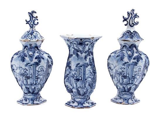 Appraisal: A Delft Tin-Glazed Earthenware Three-Piece Garniture A Delft Tin-Glazed Earthenware