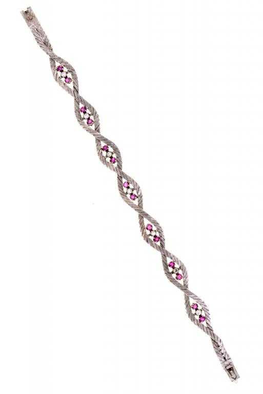 Appraisal: A RUBY AND DIAMOND BRACELET each of the seven diamonds