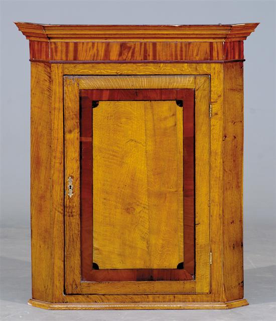 Appraisal: English inlaid oak hanging corner cabinet early th century molded