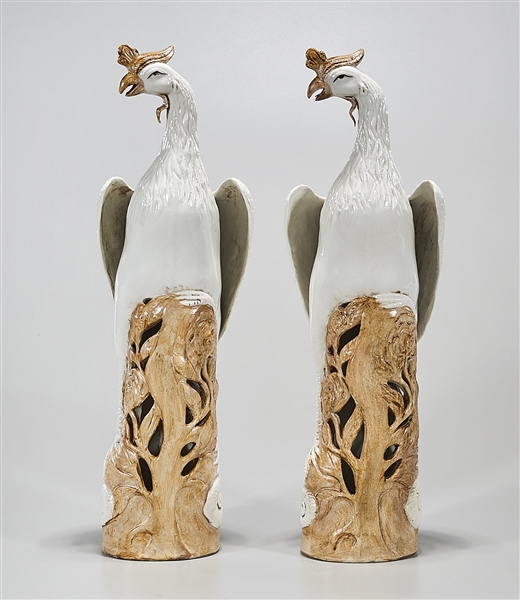 Appraisal: Two Chinese glazed porcelain phoenix sculptures x x each approx