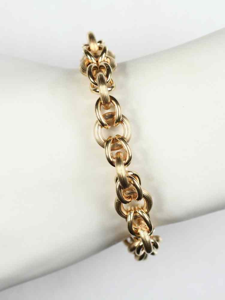 Appraisal: BRACELET - K gold round hollow threaded link bracelet dwt