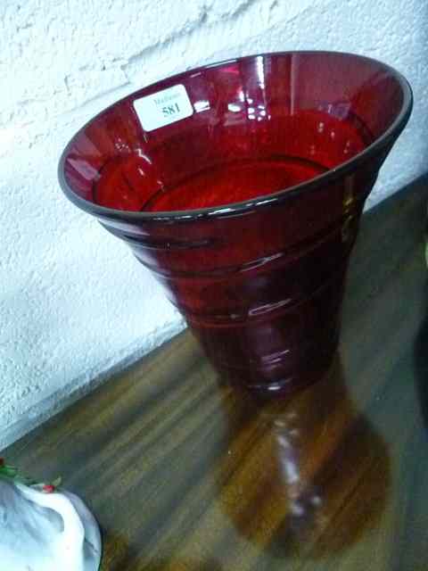 Appraisal: A RUBY GLASS VASE with spiral decoration and flaring rims