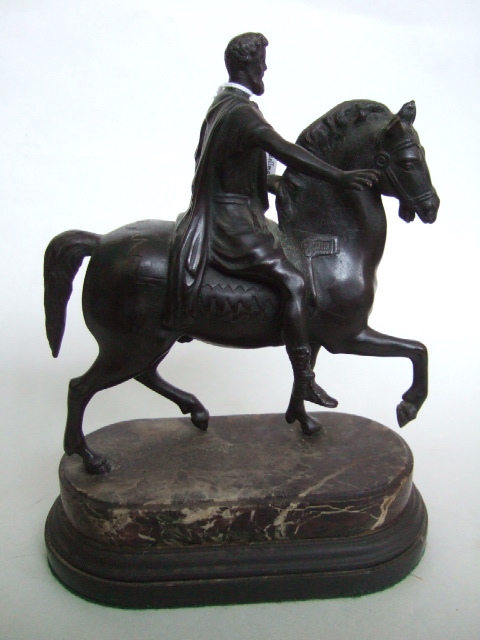 Appraisal: A patinated spelter sculpture modelled as a Roman emperor astride