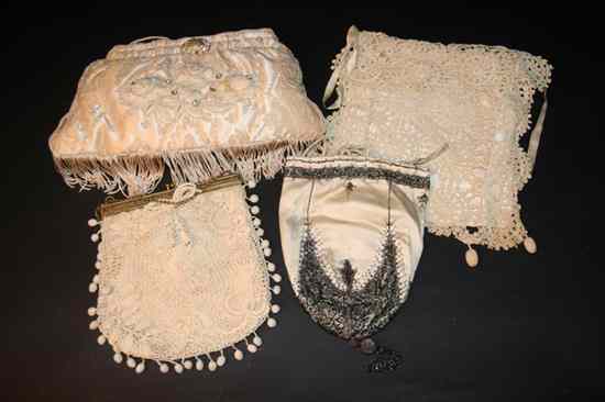 Appraisal: FOUR VINTAGE CREAM COLORED PURSES Including French steel beaded silk