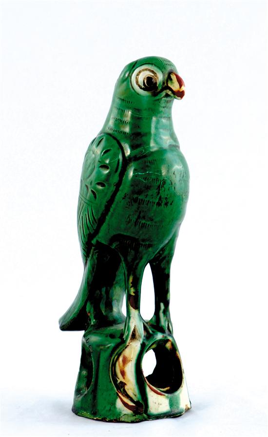 Appraisal: Chinese ceramic parrot th century standing figure resting on pierced