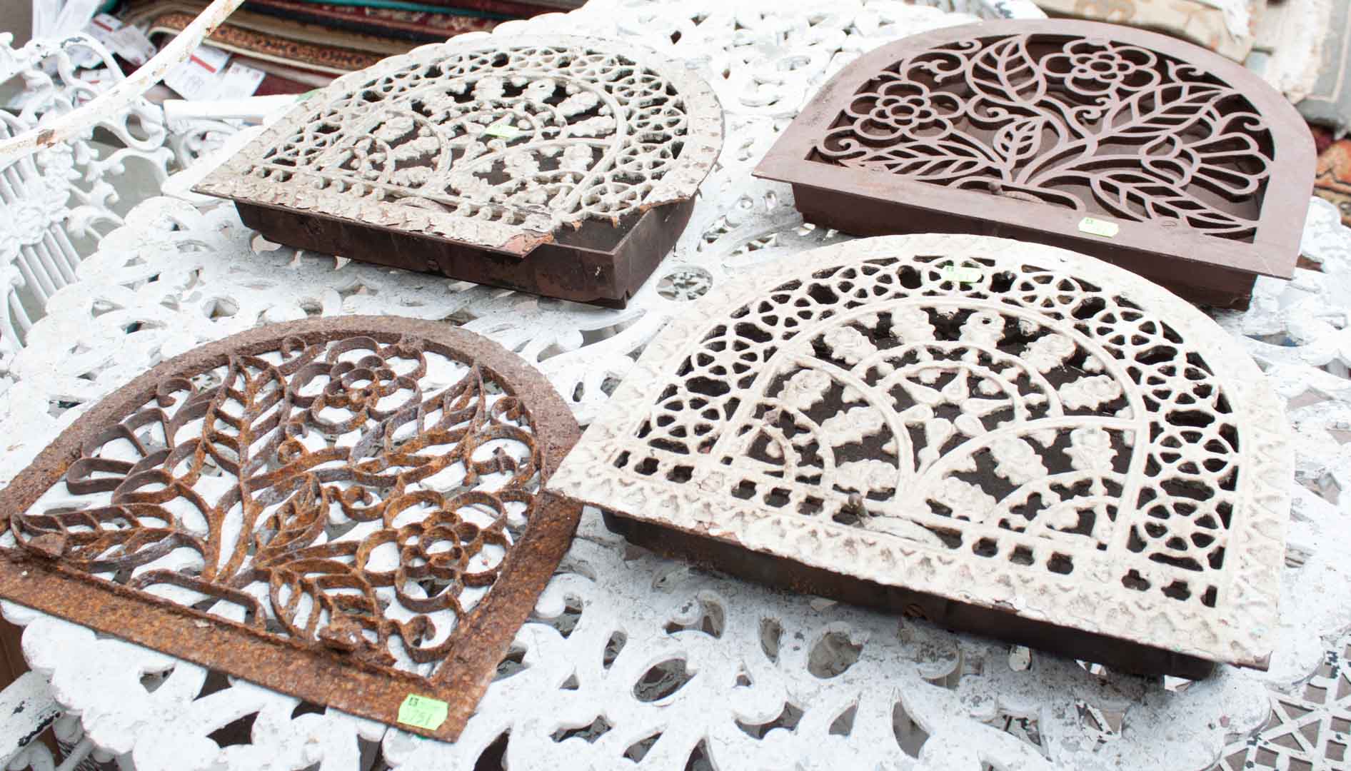 Appraisal: Four cast iron heat grates