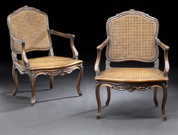 Appraisal: Pair of Louis XV-Style Carved Fruitwood Fauteuils late th century