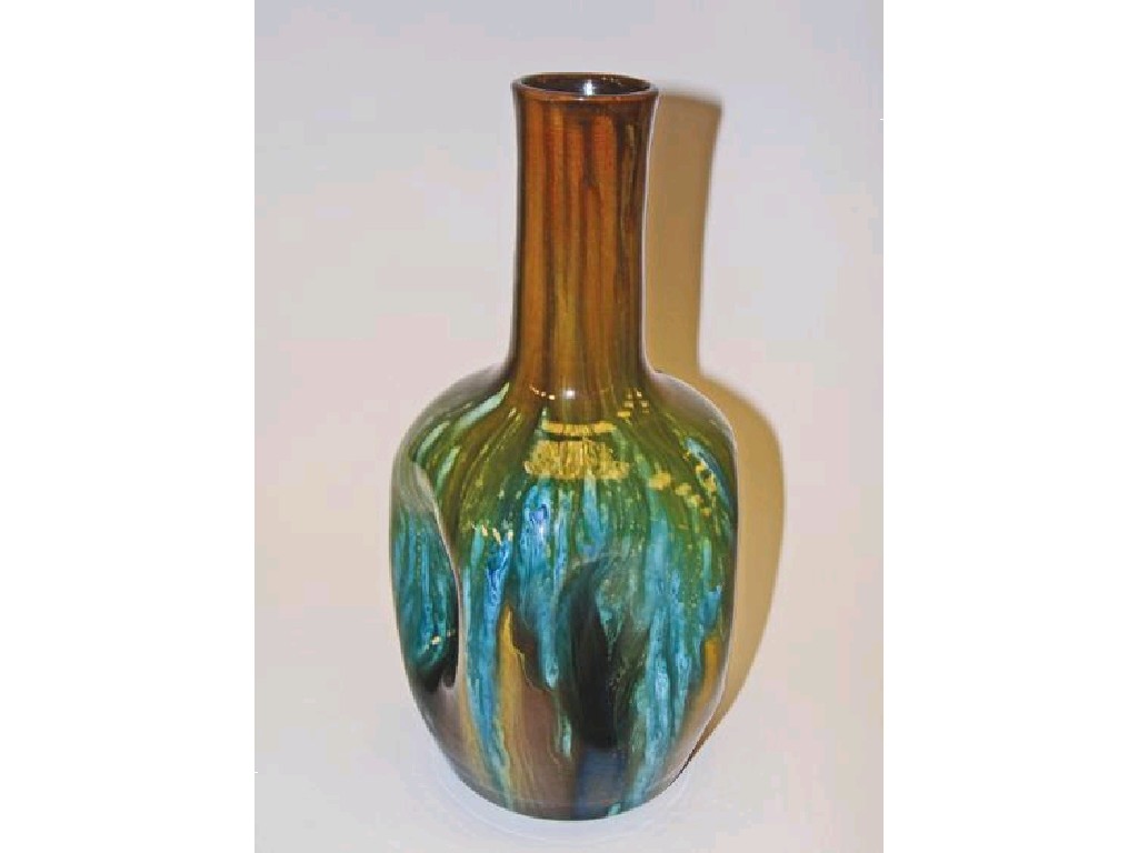 Appraisal: CHRISTOPHER DRESSER A POTTERY VASE with straight neck and indented