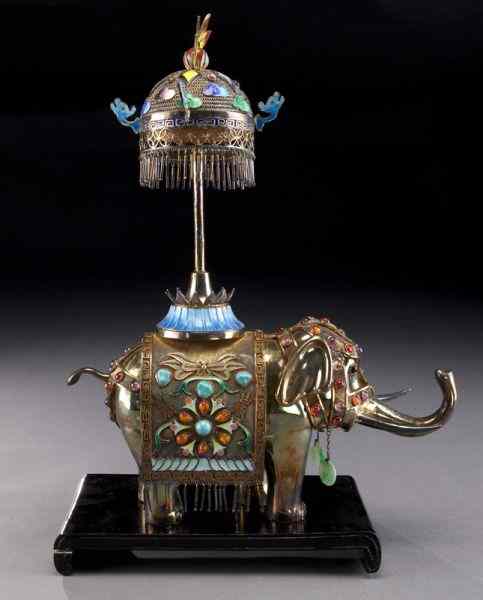 Appraisal: Chinese enamel over silver elephant with an umbrella on its