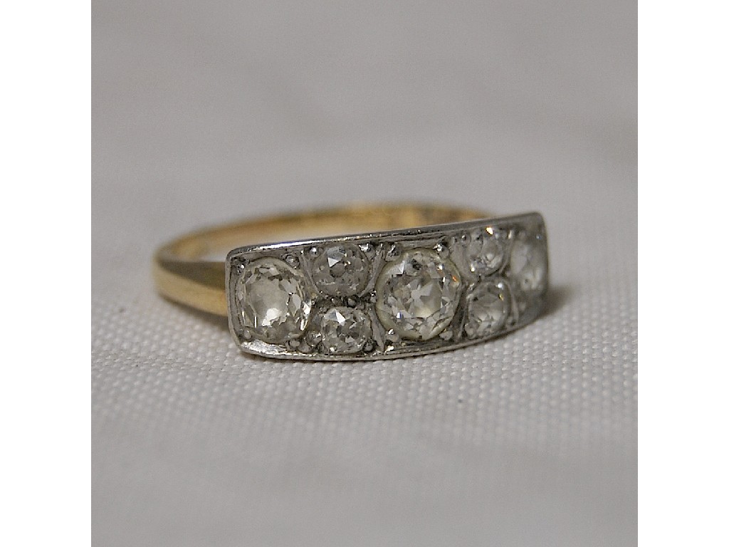 Appraisal: Diamond ring set seven diamonds yellow and white metal set