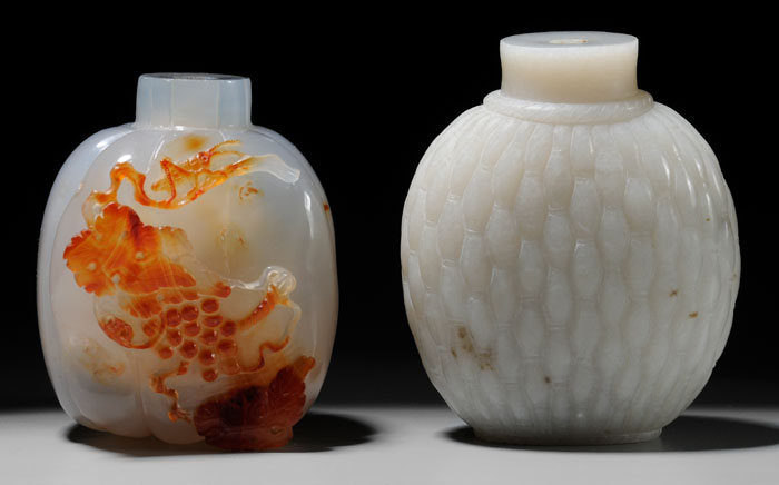 Appraisal: Two Snuff Bottles Qing Dynasty one white jade with olive