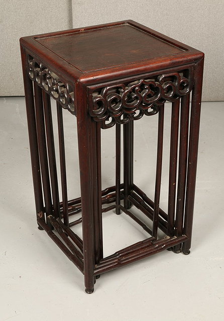 Appraisal: A QUARTETTO OF CHINESE CHERRY WOOD TEA TABLES with carved